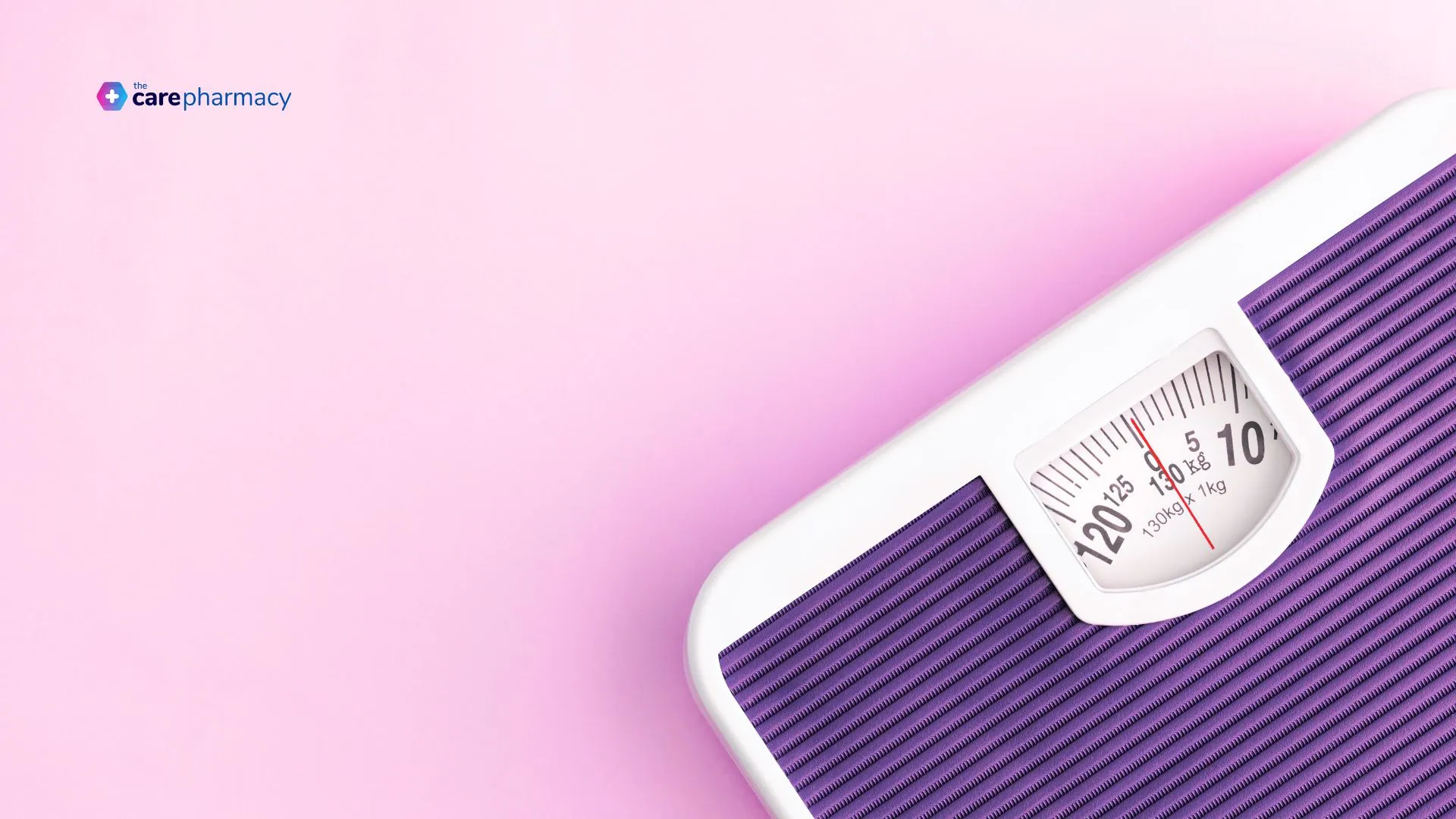 Scales in front of a pink gradient